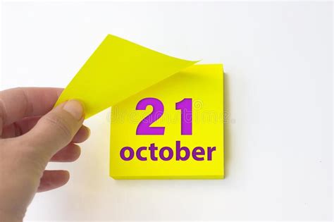 October 21st Day 21 Of Month Calendar Date Hand Rips Off The Yellow