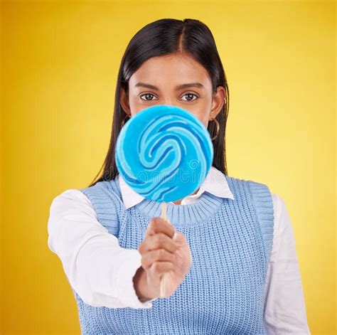 Hide Lollipop And Candy With Portrait Of Woman In Studio For Sweets