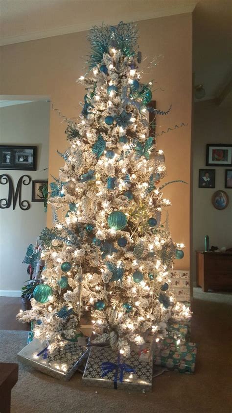 Alonsoo 3pcs x 6.6ft christmas tinsel garland, christmas tree ornaments home party classic shiny sparkly ceiling hanging decorations,4 inch wide filaments blue silver edge. Flocked tree with teal and silver decorations. | Elegant christmas trees, Silver christmas ...