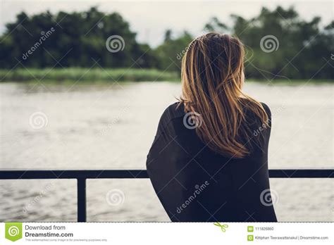 Lonely Woman Looking At The River Stock Photo Image Of Desolate