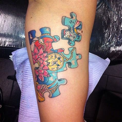 Tattoos which wrap around the ankle are eye catching 75+ Best Exclusive Puzzle Pieces Tattoos - Designs ...