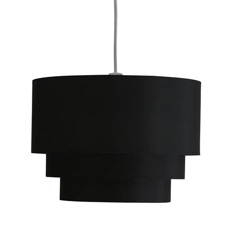 Daisy shaped shades arranged in a tiered pattern add a whimsical touch to your space while the beautiful metallic finish adds a modern flair to this charming ceiling light. Wilko 3 Tier Black Light Shade | Wilko