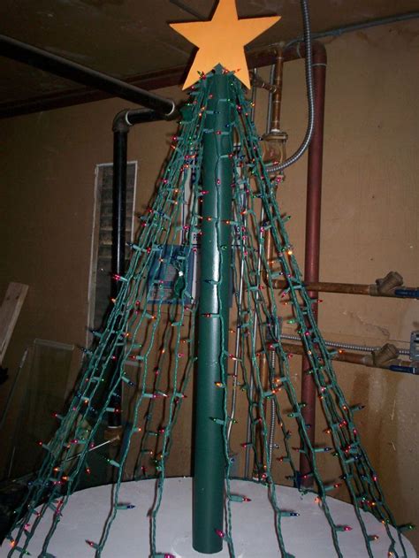 You might want to add an additional 200 feet if your tree is fat. Christmas tree made out of plywood,lights,pvc pipe | marys ...