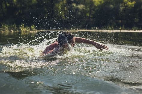 The Young Man Swimming In The River Stock Image Image Of Person