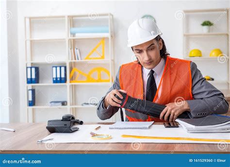 Young Male Architect Working In The Office Stock Photo Image Of Line