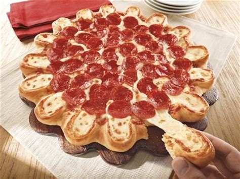 Pizzas in india is a highly competitve business. Pizza Hut rolls out 'Crazy Cheesy Crust'