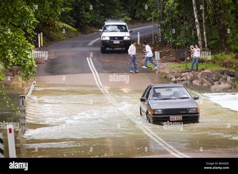 A Car Stuck In Flood Waters In The Daintree Rainforest In Queensland