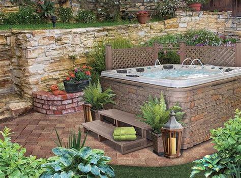 It can be on a grand scale full of trees and lawn you can place your home décor outside, your herb garden inside, hang it on a wall, or keep it a secret. 38 Awesome Garden Tub Decorating Ideas | Hot tub ...