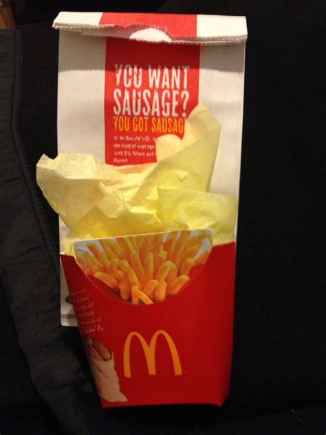 McDonald's gift card that I placed in a clean fry container with yellow tissue. Then I placed it 