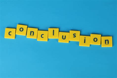 Conclusion Word Formed From Lettered Yellow Tiles · Free Stock Photo