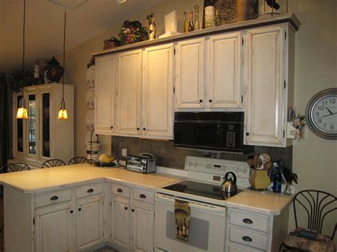 Discover inspiration for your kitchen remodel or upgrade with ideas for storage, organization, layout and decor. How To Paint Distressed Kitchen Cabinets - Loccie Better ...