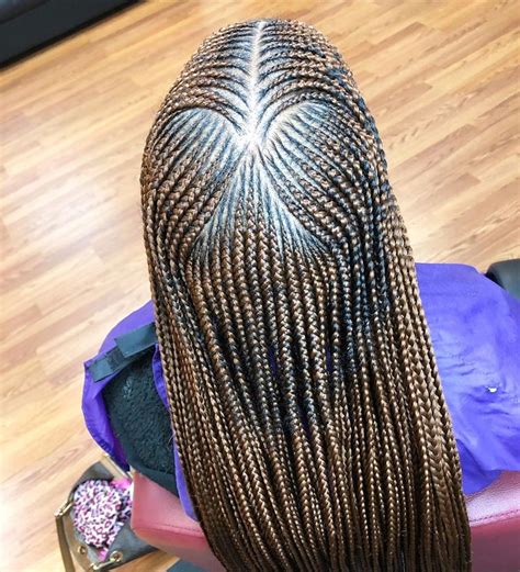 Traditional middle part sew in. Danielle on Instagram: "Middle part feed in braids ...