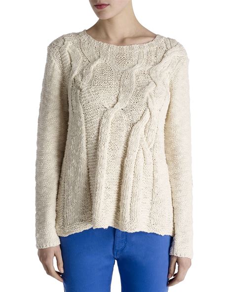 A New Twist On The Classic Cable Knit This Cozy Cream Sweater Has An