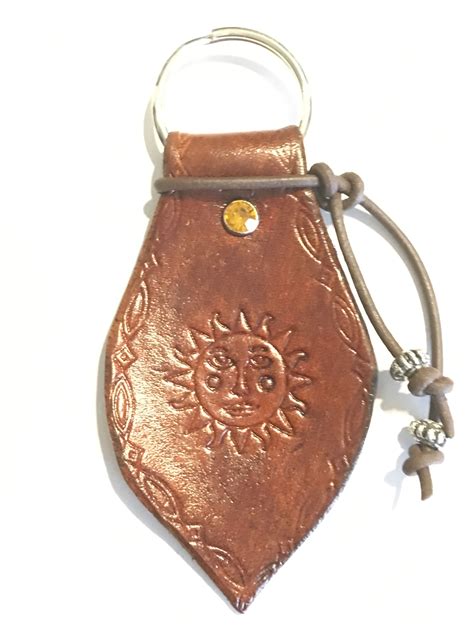 Handmade Leather Key Fob With Sun Imprint And Amber Rhinestone
