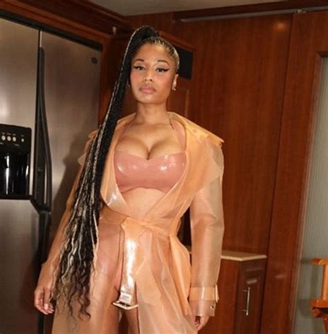nicki minaj flaunts her ample cleavage in low cut swimsuit daily mail online