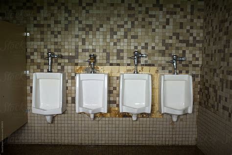 Mens Urinals In Public Restroom By Stocksy Contributor David Smart