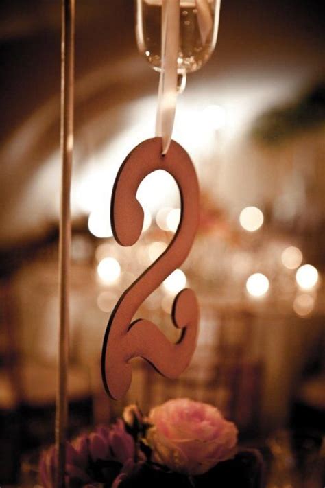 Very Elegant And Classic Hanging Table Numbers For A Beautiful Wedding