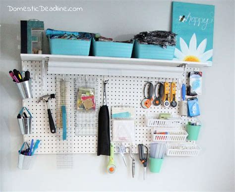 This is an organizer's dream come true… so many places to put things! Craft Room Pegboard 3 | Domestic Deadline