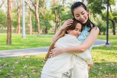 Little Daughter Hug Mother In The Park Stock Image Image Of Daughter