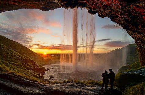 A Beautiful Sunset At Seljalandsfoss Waterfall In Iceland Photograph By