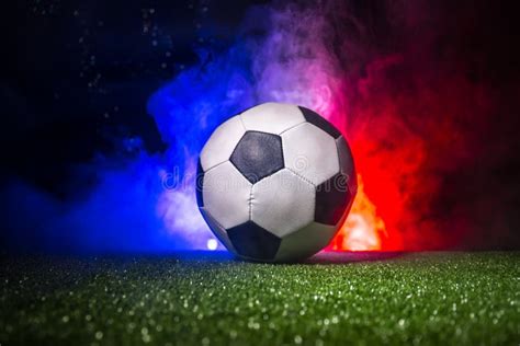 Soccer Ball On Grass With France Flag With Smoke And Lights Soccer