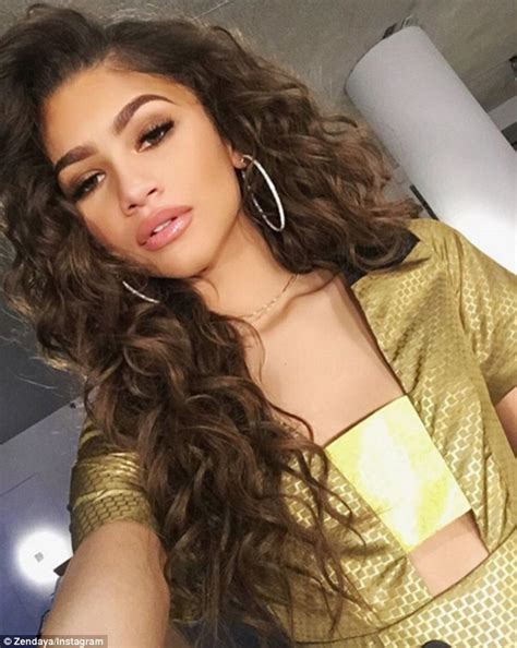 zendaya shows off her new wavy weave as she steps out in multi coloured dress in new york