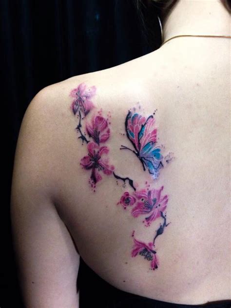 I absolutely love everything about it. Watercolor cherry blossom with butterfly tattoo ...