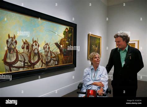 Artist Jamie Wyeth R And His Wife Phyllis Pose For A Photograph In