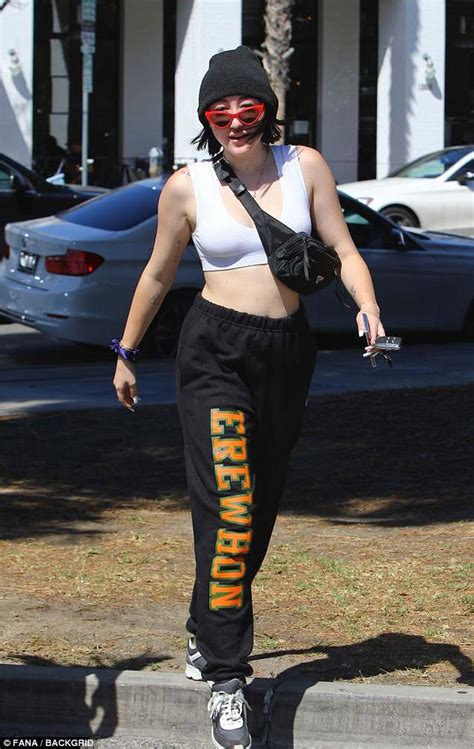 Miley Cyrus Flashes Her Toned Tummy As She Shows Off Figure In La