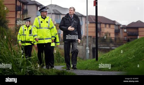 Justice Secretary Kenny Macaskill Right Walks With Chief Inspector