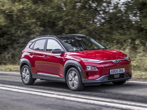The compact utility vehicle features a spacious interior for its size that's equipped with reclining front seats with footrests. Hyundai Kona Electric driving range corrected to 279 miles