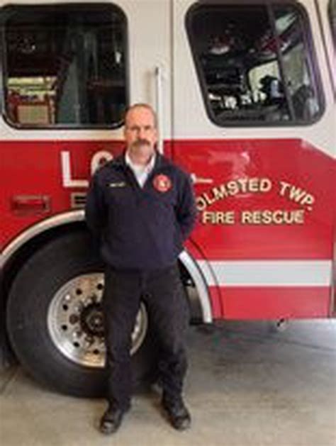 Olmsted Township Acting Fire Chief John Rice Assisted Firefighter As A