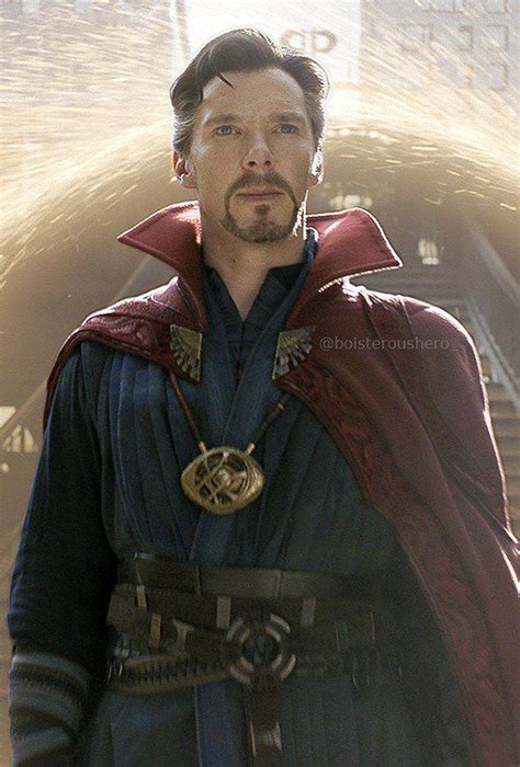 A Man Dressed As Doctor Strange Standing In Front Of A Building With