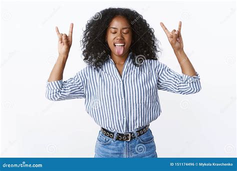 Sassy African American Woman Having Fun Ready Rock N Roll Showing Heavy Metal Gesture Close Eyes