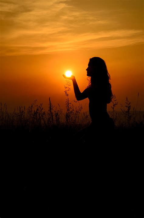 Girl Holding The Sun In Her Palm Girl Holding The Sun In Her Palm