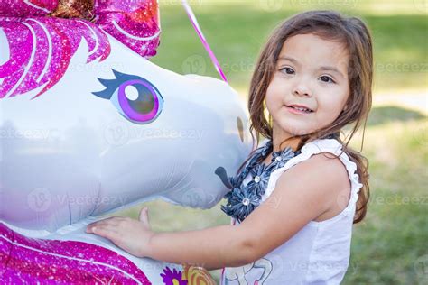 Cute Young Mixed Race Baby Girl Holding Mylar Balloon Outdoors 16358973