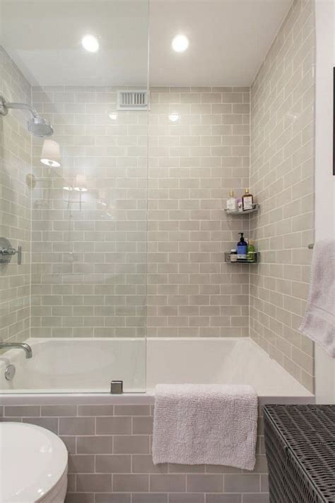 A Bathroom With A Tub Toilet And Sink In Its Shower Stall Area