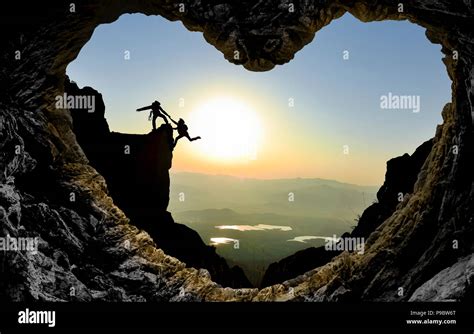 Help And Reach The Goal Together Stock Photo Alamy