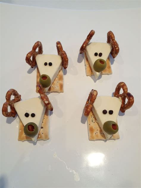 Appetizers for christmas parties and dinners. A cute Christmas treat using Laughing Cow cheese, pretzels ...
