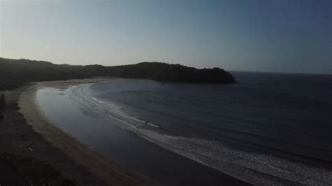 Drone entering the beach at nightfall Stock Footage,#beach 