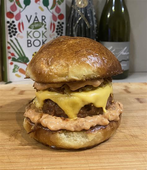 Cheeseburger With Caramelised Onions And Secret Sauce On Homemade