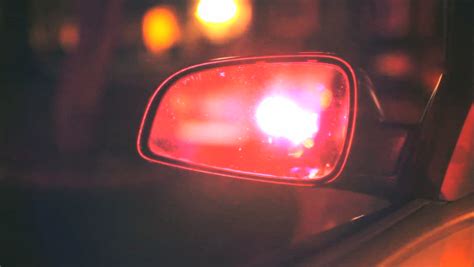 Maybe you would like to learn more about one of these? Police Flashing Lights In Car Rear View Mirror At Night ...