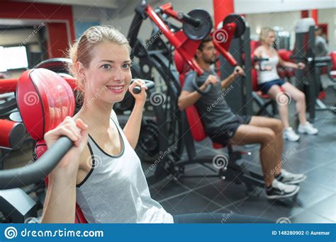People Working Out In Gym Woman In Foreground Stock Photo Image Of