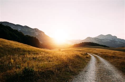 Premium Photo Dirt Gravel Mountain Road On Sunset