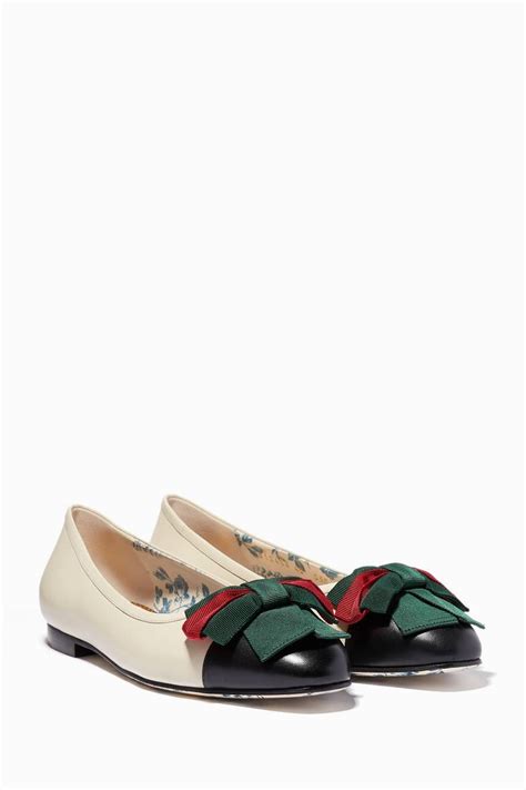 Timepieces and jewelry are produced by gucci's own skilled craftsmen: Shop Luxury Gucci Off-White Web Bow Ballet Flats | Ounass ...
