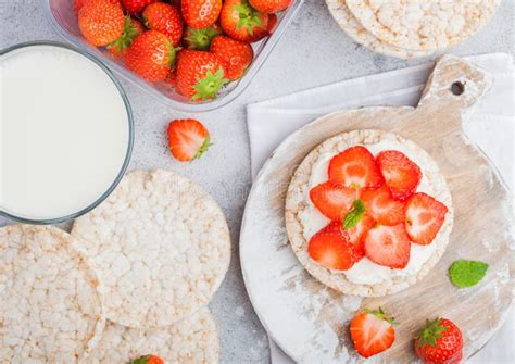 Healthy Organic Rice Cakes With Ricotta And Fresh Strawberries And