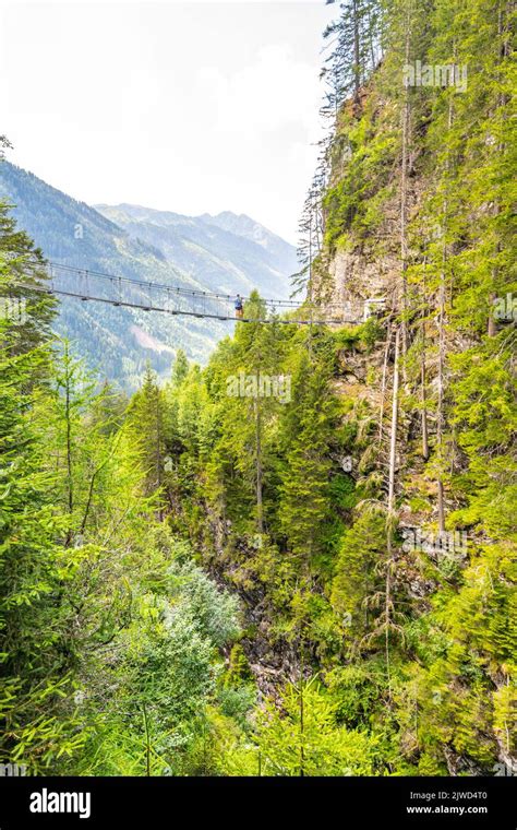 Simple Suspension Footbridge Over Mountain Valley Stock Photo Alamy
