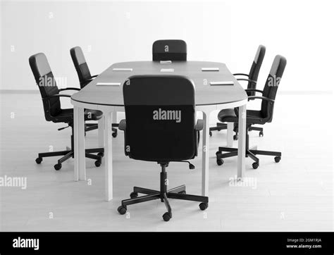 Modern Office Interior With Table And Black Armchairs Stock Photo Alamy