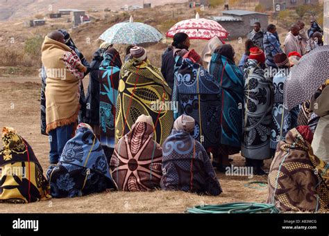 Basotho Women And Men Covered In Traditional Blankets To Keep Warm