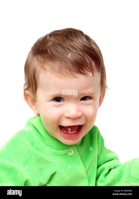 Happy Laughing Baby In Green Isolated On White Stock Photo Alamy